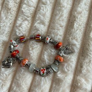 Elegant Silver and Orange Beaded Bracelet